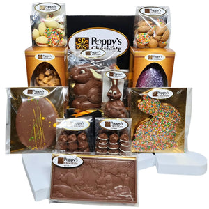 An assortment of Poppys Chocolates in Poppy's Black Hamper Box. The selection includes various Easter Chocolates from Easter Eggs to Easter Bunnies.