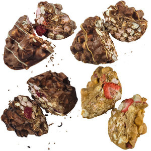 A collection of four different flavoured Rocky Road Easter eggs, each with a mix of chocolate and nuts, arranged side by side.
