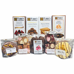 Poppy’s Team Faves Box filled with assorted chocolates, Pies, rocky road, bark, and chocolate coated treats.