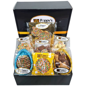 A hamper box from Poppy's Chocolate containing an assortment of Easter eggs and Easter Bunny chocolates sprinkled with 100s & 1000s.