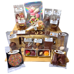 Poppy's Deluxe Show Bag featuring the exclusive handcrafted Chocolate Strawberry Sundae Waffle Cone alongside a selection of chocolate samples and gourmet treats.