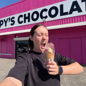 Poppy's Deluxe Show Bag featuring the exclusive handcrafted Chocolate Strawberry Sundae Waffle Cone alongside a selection of chocolate samples and gourmet treats.