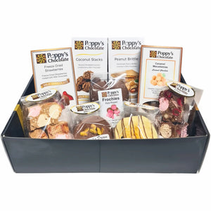 Poppy’s Team Faves Box filled with assorted chocolates, Pies, rocky road, bark, and chocolate coated treats.