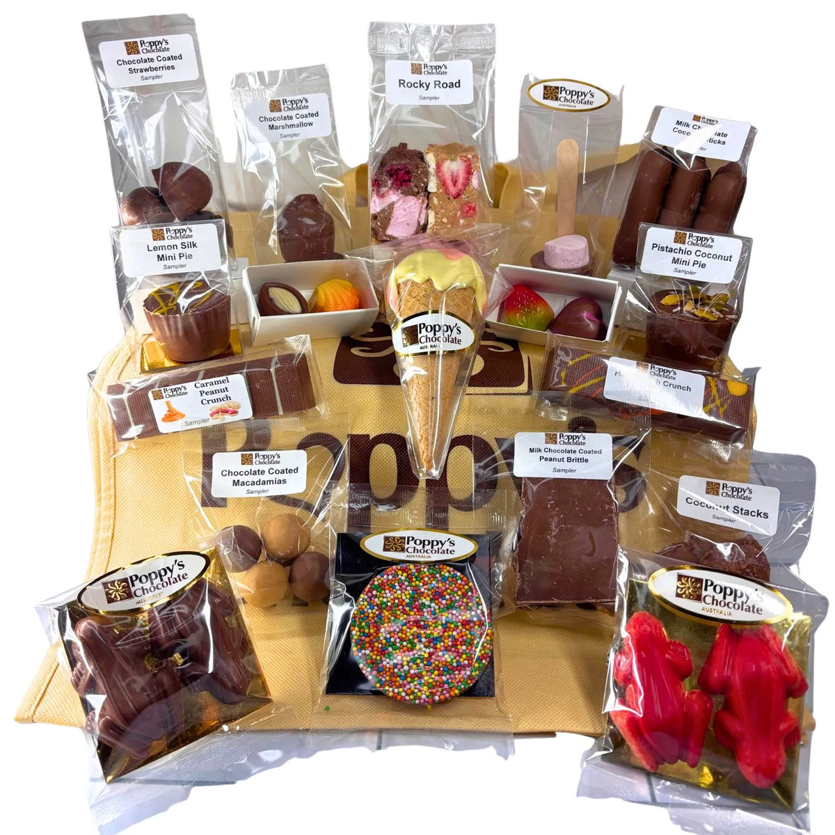 Poppy's Gluten Free Show Bag packed with gluten-free chocolate samples, Strawberry Sundae Cone, rocky road, chocolate-coated strawberries, gourmet treats, and a tote bag.