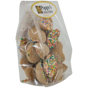 Mini Half Easter Eggs in Caramel Chocolate half-covered with colourful sprinkles in clear bag.