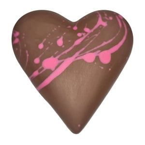 Chocolate heart with pink splashes on a white background