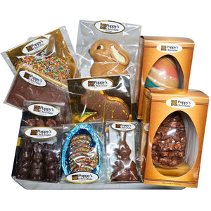 An assortment of Poppys Chocolates in Poppy's Black Hamper Box. The selection includes various Easter Chocolates from Easter Eggs to Easter Bunnies.