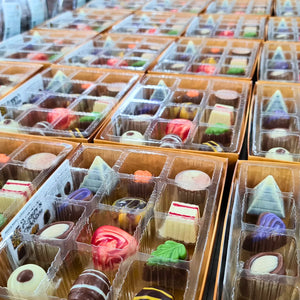 Experience the delight of a Gift Box featuring 12 gourmet chocolates, beautifully crafted into heart shapes, swirls, and marbled patterns. This elegant collection from Poppy's Chocolate is presented in a premium gift box and weighs 130 grams, making it an irresistible treat for any occasion.