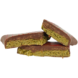 Stacked pieces of Dubai Pistachio Star showing the pistachio and kataifi filling.