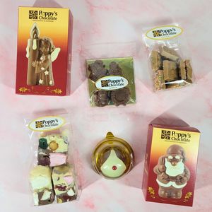 Overhead view of the six packaged treats included in Poppy’s Favourite Christmas Treats Hamper.