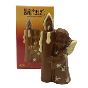 A chocolate figurine of an angel holding a candle, positioned in front of its packaging box with 'Poppy's Chocolate' branding.
