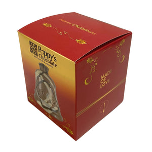 Angled view of the marbled milk chocolate Christmas bell gift box, showing the front, side and lid.