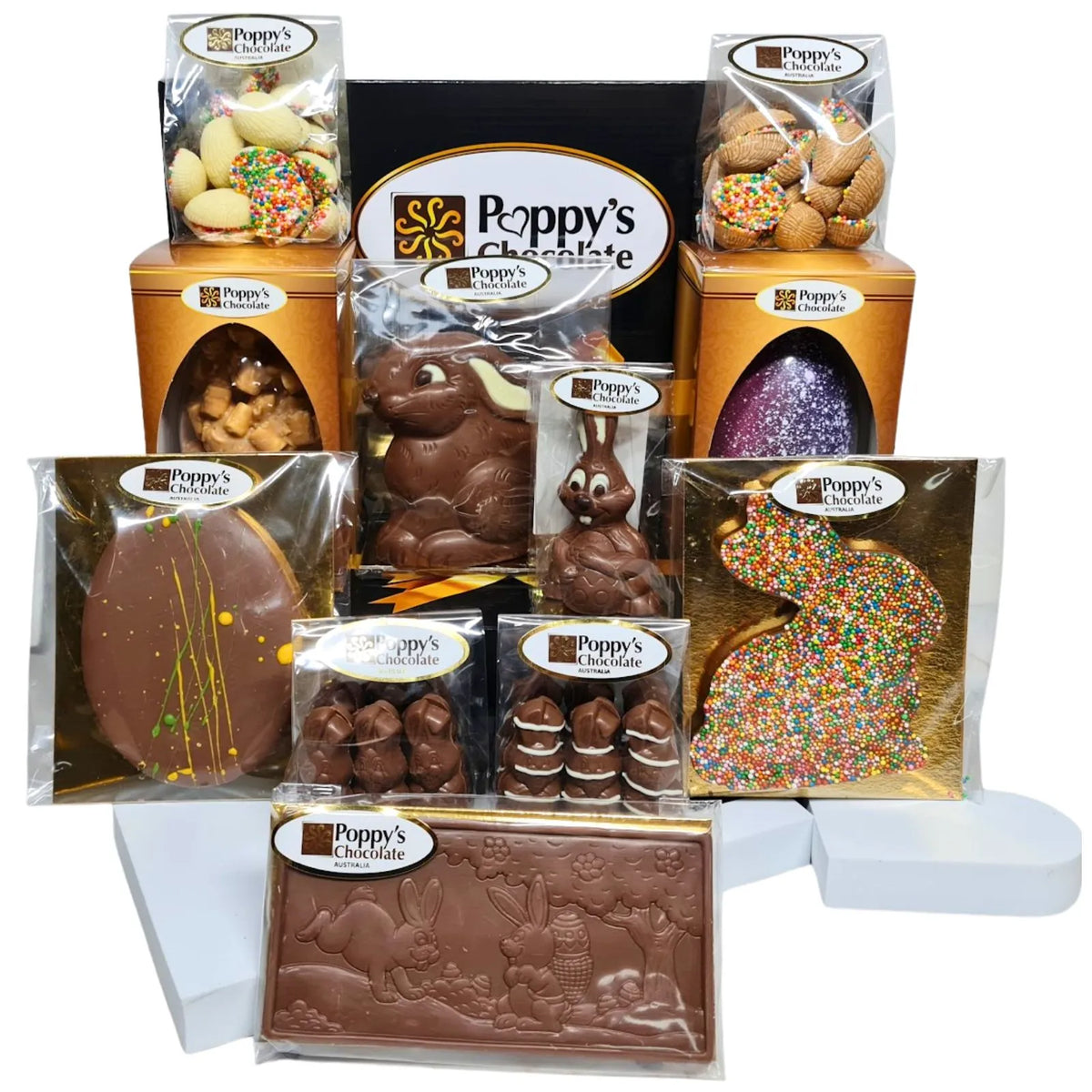 An assortment of Poppys Chocolates in Poppy's Black Hamper Box. The selection includes various Easter Chocolates from Easter Eggs to Easter Bunnies.