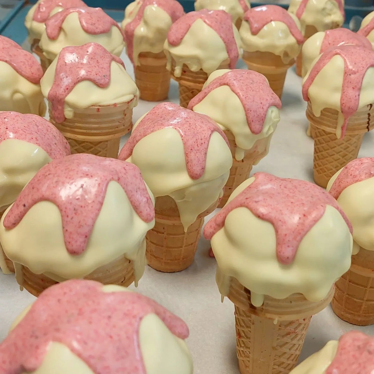 Poppy's Junior Show Bag features our exclusive handcrafted Chocolate Strawberry Sundae Waffle Cone for Kids and filled with chocolate samples, lollies, caramel popcorn, hot chocolate stick, chocolate frogs, fun bark, and sweet treats for kids.