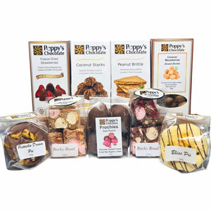 Poppy’s Team Faves Box filled with assorted chocolates, Pies, rocky road, bark, and chocolate coated treats.