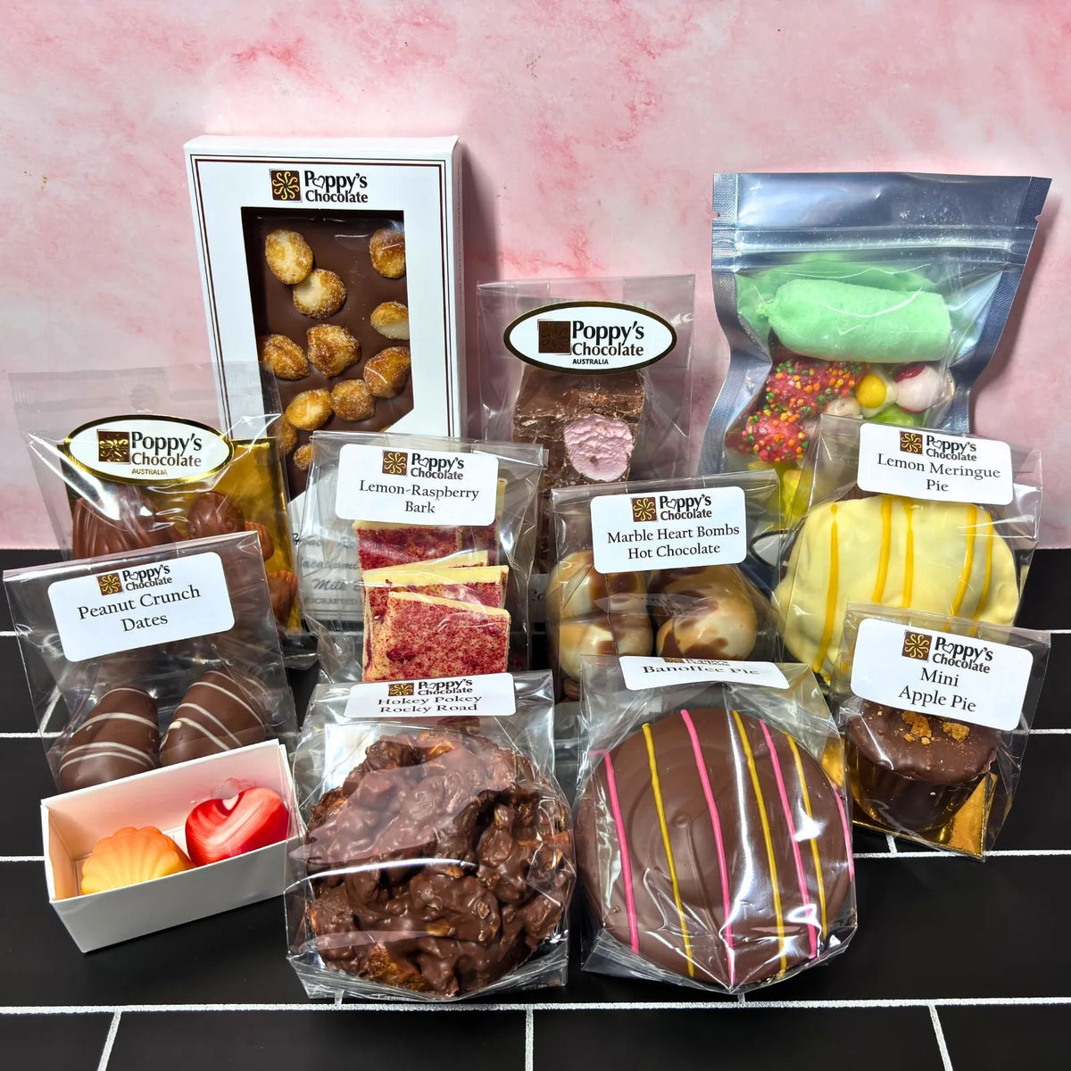 Poppy's 21st Birthday Treasure Box filled with exclusive handcrafted chocolates in a gourmet gift box.