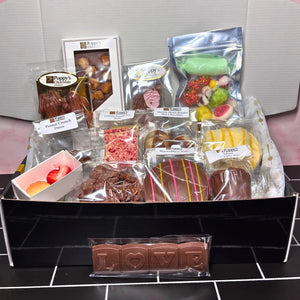 Poppy's 21st Birthday Treasure Box filled with exclusive handcrafted chocolates in a gourmet gift box.
