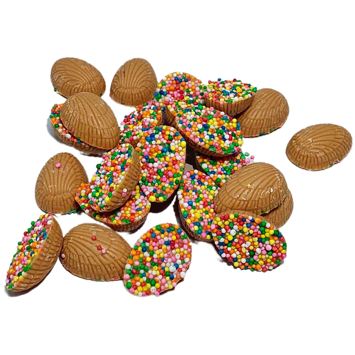 A pile of Mini Half Easter Eggs in Caramel Chocolate half-covered with colourful sprinkles. 