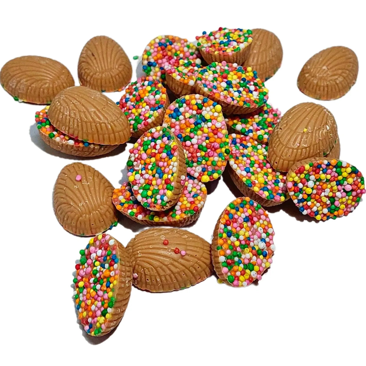 A pile of Mini Half Easter Eggs in Caramel Chocolate half-covered with colourful sprinkles. 