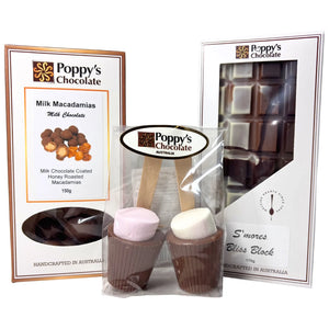 Sneaky Snack Hamper containing milk honey roasted macadamias, S’mores Bliss Block, and hot chocolate sticks twin pack
