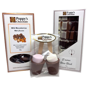Sneaky Snack Hamper containing milk honey roasted macadamias, S’mores Bliss Block, and hot chocolate sticks twin pack