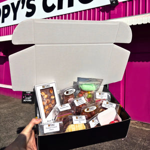 Poppy's 21st Birthday Treasure Box filled with exclusive handcrafted chocolates in a gourmet gift box.