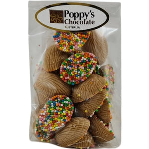 Mini Half Easter Eggs in Caramel Chocolate half-covered with colourful sprinkles in clear bag.