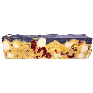 Poppy’s Chocolate limited edition tropical twist rocky road made with white chocolate, freeze-dried mango, pineapple, raspberries, coconut shreds, marshmallows, and topped with ube white chocolate
