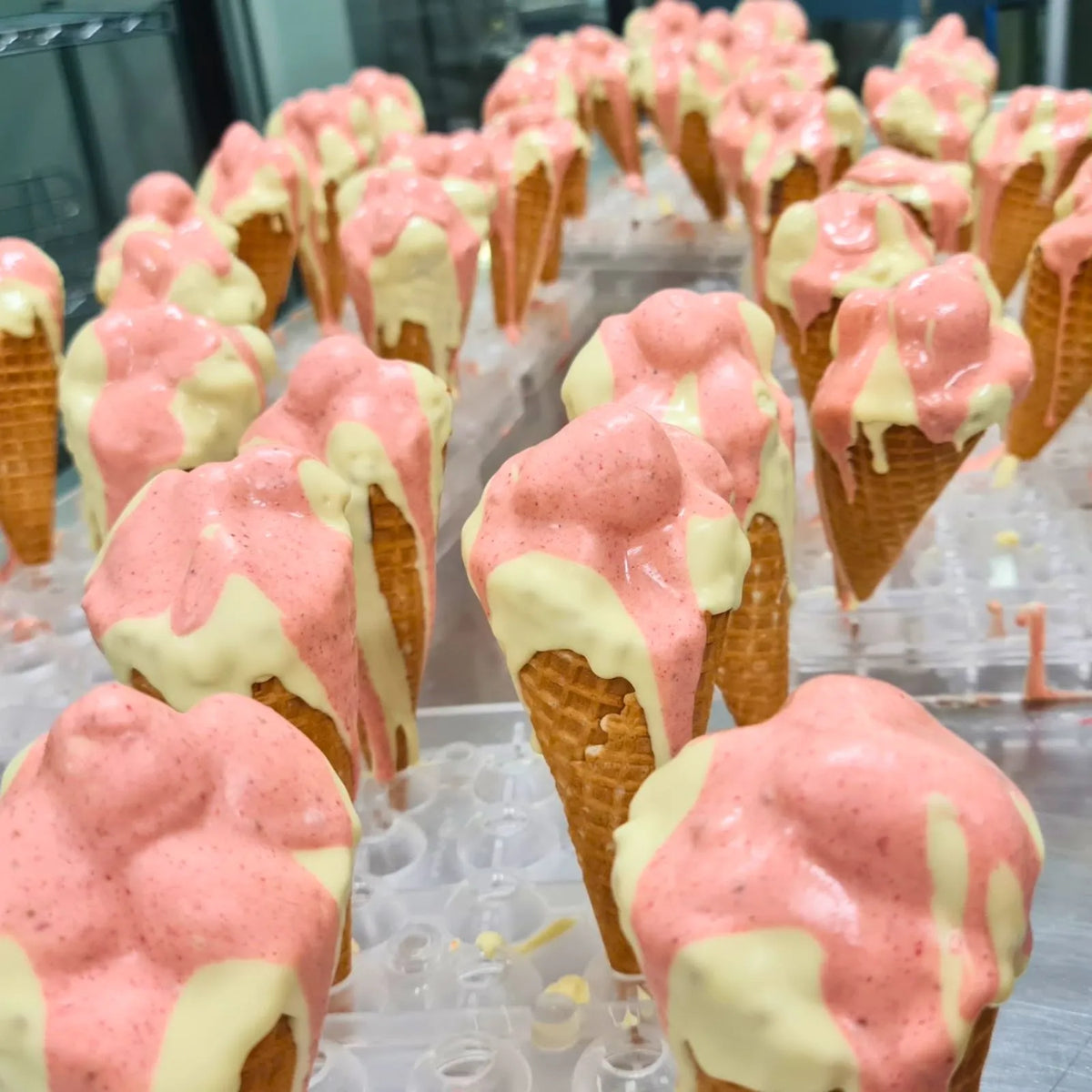Poppy's Deluxe Show Bag featuring the exclusive handcrafted Chocolate Strawberry Sundae Waffle Cone alongside a selection of chocolate samples and gourmet treats.