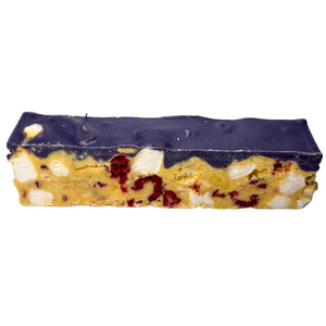 Poppy’s Chocolate limited edition tropical twist rocky road made with white chocolate, freeze-dried mango, pineapple, raspberries, coconut shreds, marshmallows, and topped with ube white chocolate
