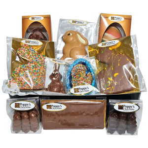 An assortment of Poppys Chocolates in Poppy's Black Hamper Box. The selection includes various Easter Chocolates from Easter Eggs to Easter Bunnies.