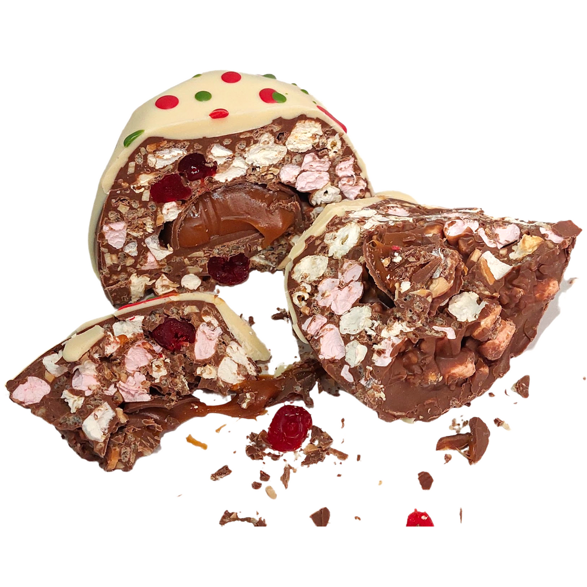 Bliss Dome cut open to reveal its filling, with a white chocolate topping and red and green decorations.