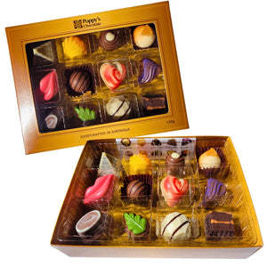 Experience the delight of a Gift Box featuring 12 gourmet chocolates, beautifully crafted into heart shapes, swirls, and marbled patterns. This elegant collection from Poppy's Chocolate is presented in a premium gift box and weighs 130 grams, making it an irresistible treat for any occasion.