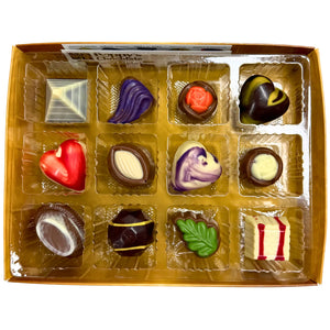 Experience the delight of a Gift Box featuring 12 gourmet chocolates, beautifully crafted into heart shapes, swirls, and marbled patterns. This elegant collection from Poppy's Chocolate is presented in a premium gift box and weighs 130 grams, making it an irresistible treat for any occasion.