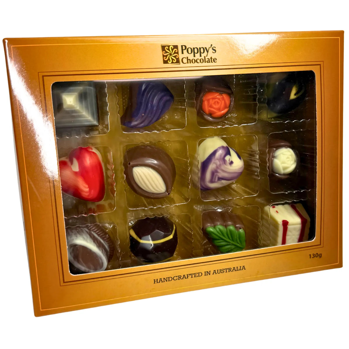 Experience the delight of a Gift Box featuring 12 gourmet chocolates, beautifully crafted into heart shapes, swirls, and marbled patterns. This elegant collection from Poppy's Chocolate is presented in a premium gift box and weighs 130 grams, making it an irresistible treat for any occasion.