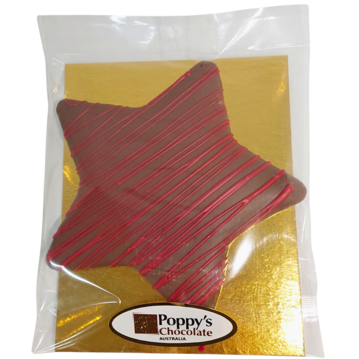 Dubai Pistachio Star in clear packaging with a gold backing and Poppy’s Chocolate label.