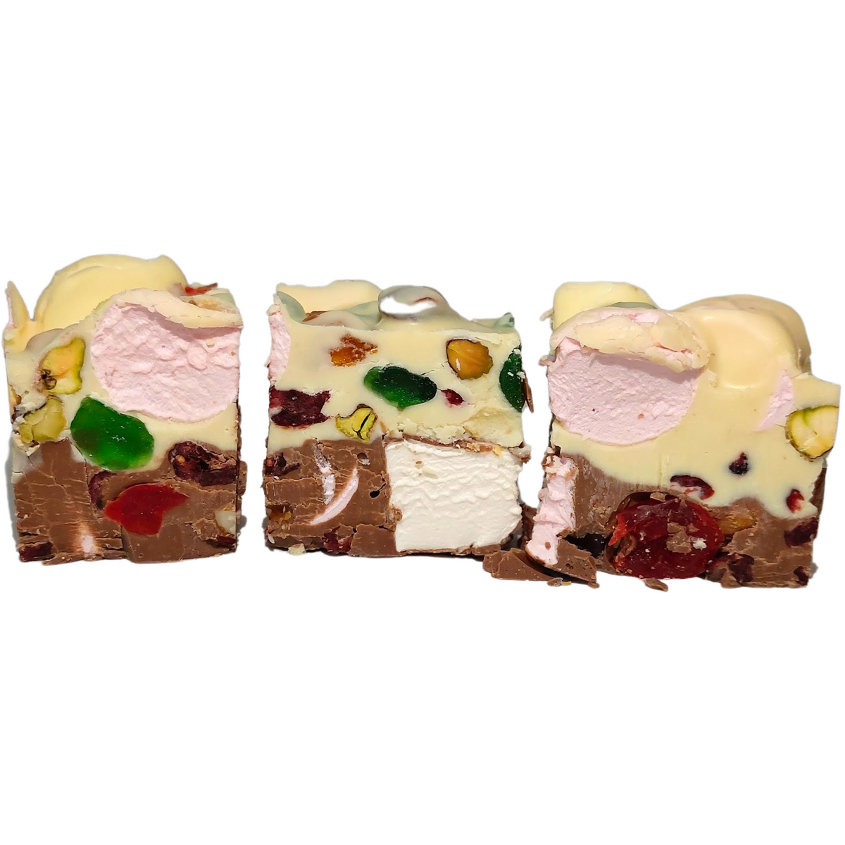 A photo of a double decker rocky road slice with visible glace cherries, pistachios, and marshmallows, set on a white background.