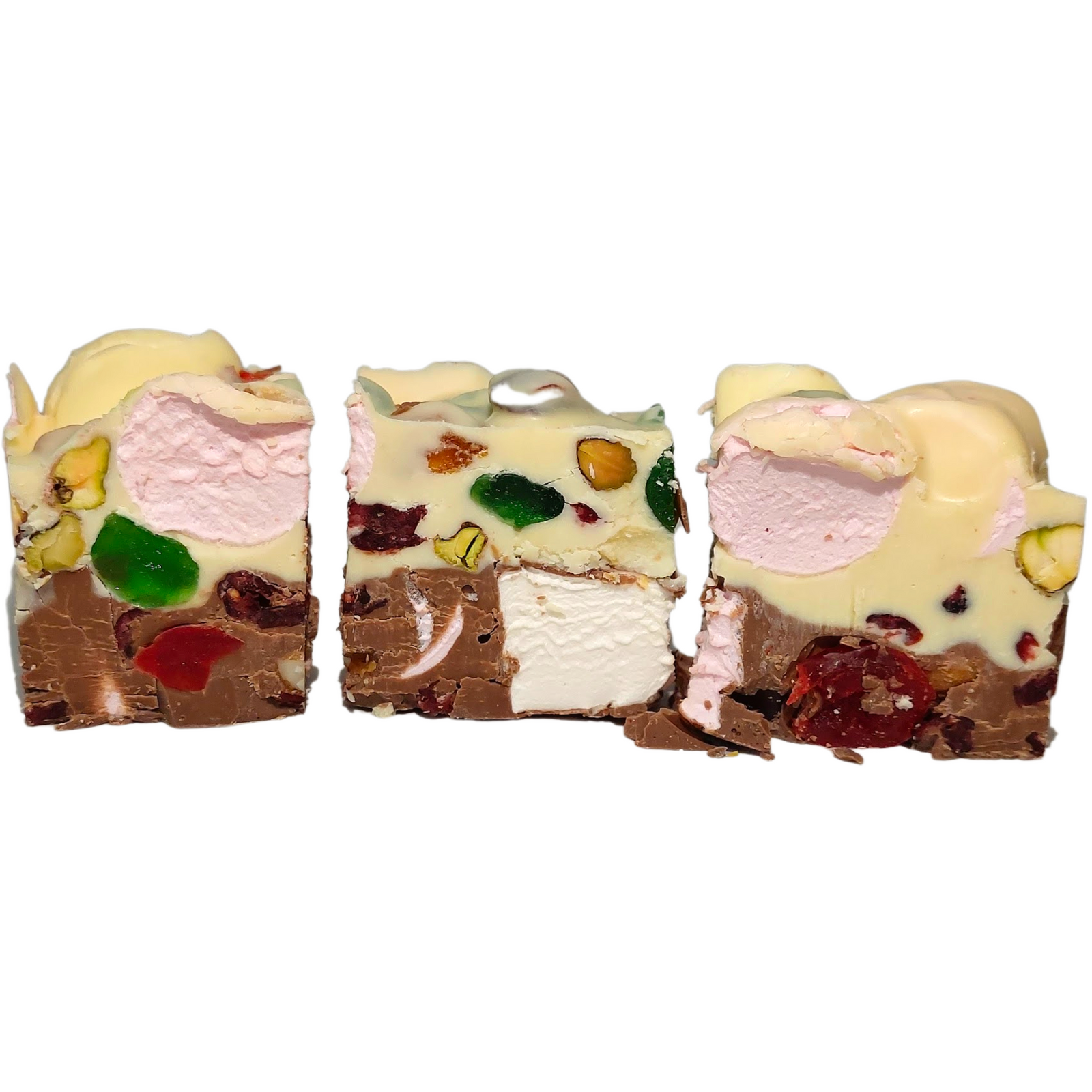 A photo of a double decker rocky road slice with visible glace cherries, pistachios, and marshmallows, set on a white background.