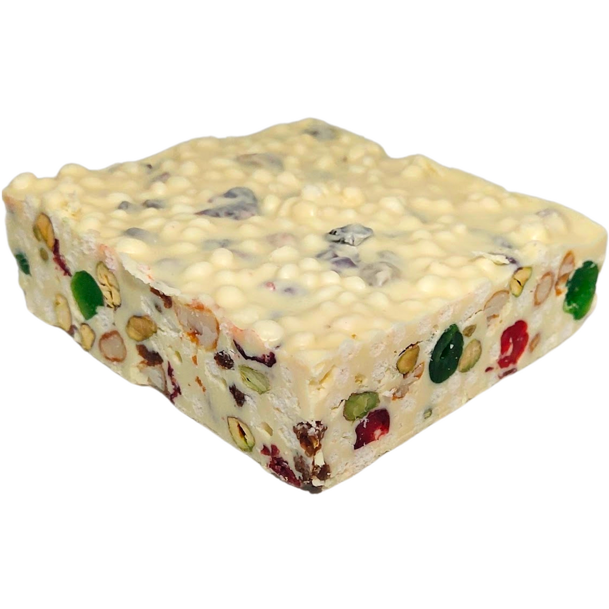 Angled view of Poppy’s White Christmas block showing its square shape, thickness and fruit and nut pieces.
