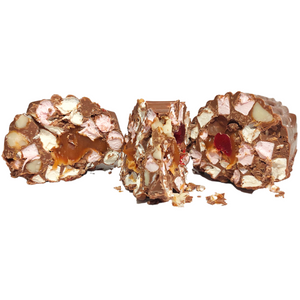 Three rocky road log slices showing marshmallows, nuts and a caramel centre.