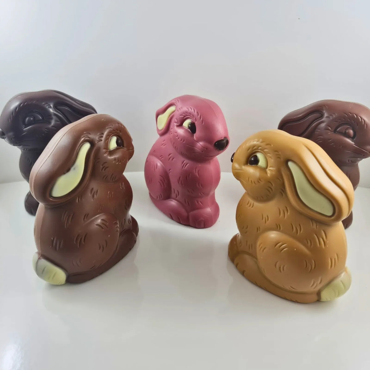 Poppy's Chocolate Sitting Bunny in Caramel, Milk, Dark, Ruby, and Mylk.