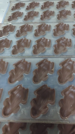 Making caramel filled chocolate frogs