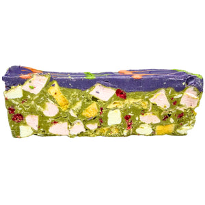 Wicked Witch Halloween Rocky Road with a purple ube chocolate top, green matcha centre, freeze-dried mango, pineapple and raspberries, mini marshmallows and coconut shreds.
