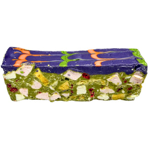 Wicked Witch Halloween Rocky Road with a purple ube chocolate top, green matcha centre, freeze-dried mango, pineapple and raspberries, mini marshmallows and coconut shreds.