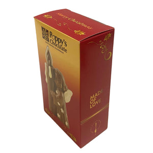 A chocolate figurine of an angel holding a candle, positioned in front of its packaging box with 'Poppy's Chocolate' branding.