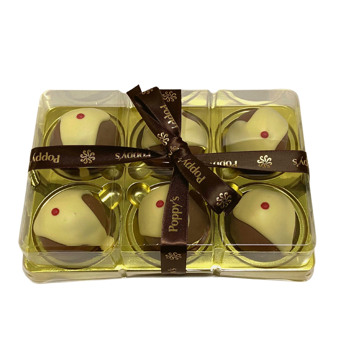 Six mini chocolate-coated puddings in a gold gift tray with a clear lid and brown Poppy’s ribbon