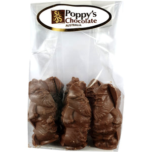 Salted Caramel Santas 12-pack in a clear Poppy’s Chocolate gift bag.