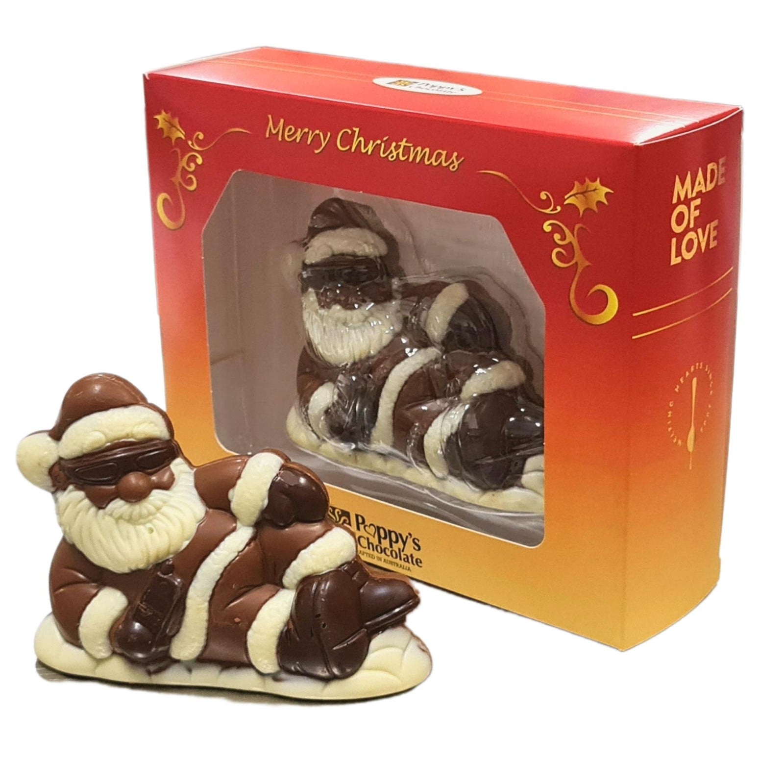 Santa Cool & Easy milk chocolate figure wearing sunglasses and reclining in front of its red and gold Christmas gift box.
