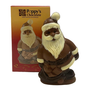 Milk chocolate Santa with a bag of presents beside its red and gold Poppy’s Chocolate gift box.