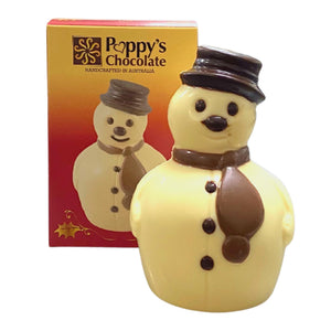 White chocolate snowman with a chocolate hat, scarf and buttons beside its Poppy’s Chocolate gift box.